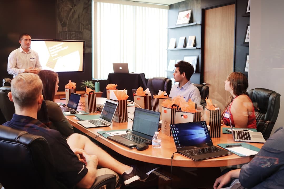 A team collaborating on website design, illustrating the importance of creating a site that attracts the right clients.