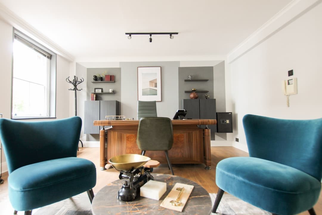 A calm and inviting psychologist's office with comfortable seating and warm lighting, setting a welcoming tone for clients.