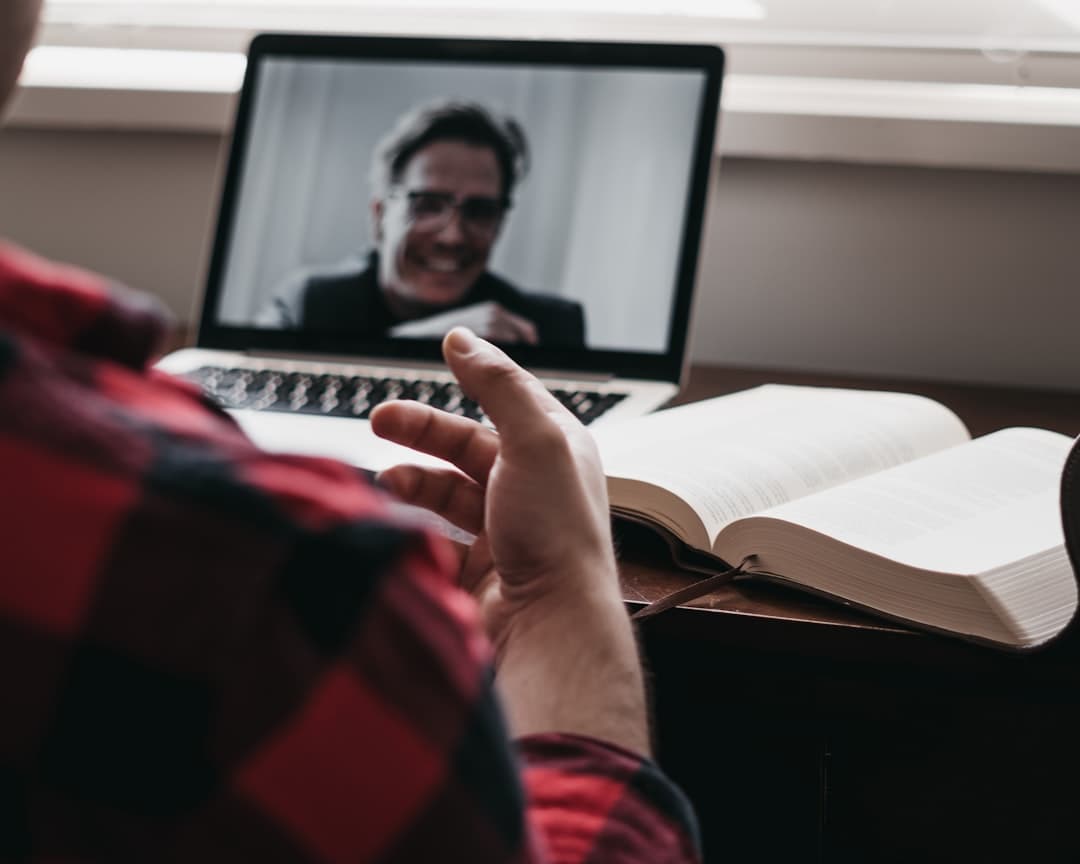 A therapist conducting a virtual consultation, highlighting the expansion of private practice services beyond borders.