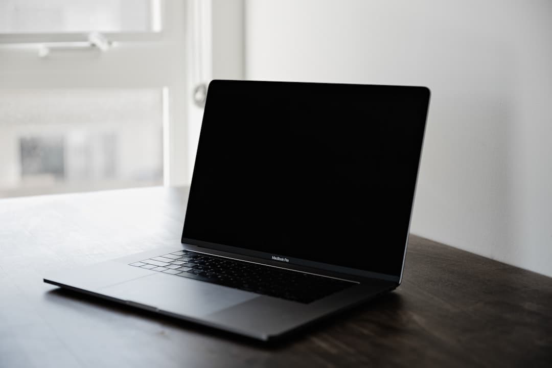 A therapist's office with a laptop open on a desk, symbolizing digital strategies like retargeting ads for therapy practices.