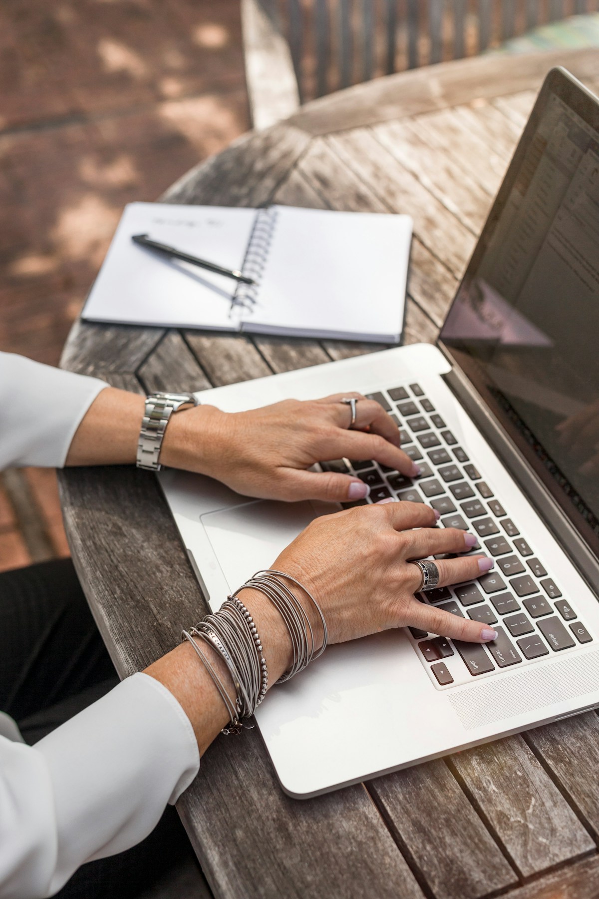 Notebook, pen, and coffee cup on a tidy desk for planning private practice marketing tasks