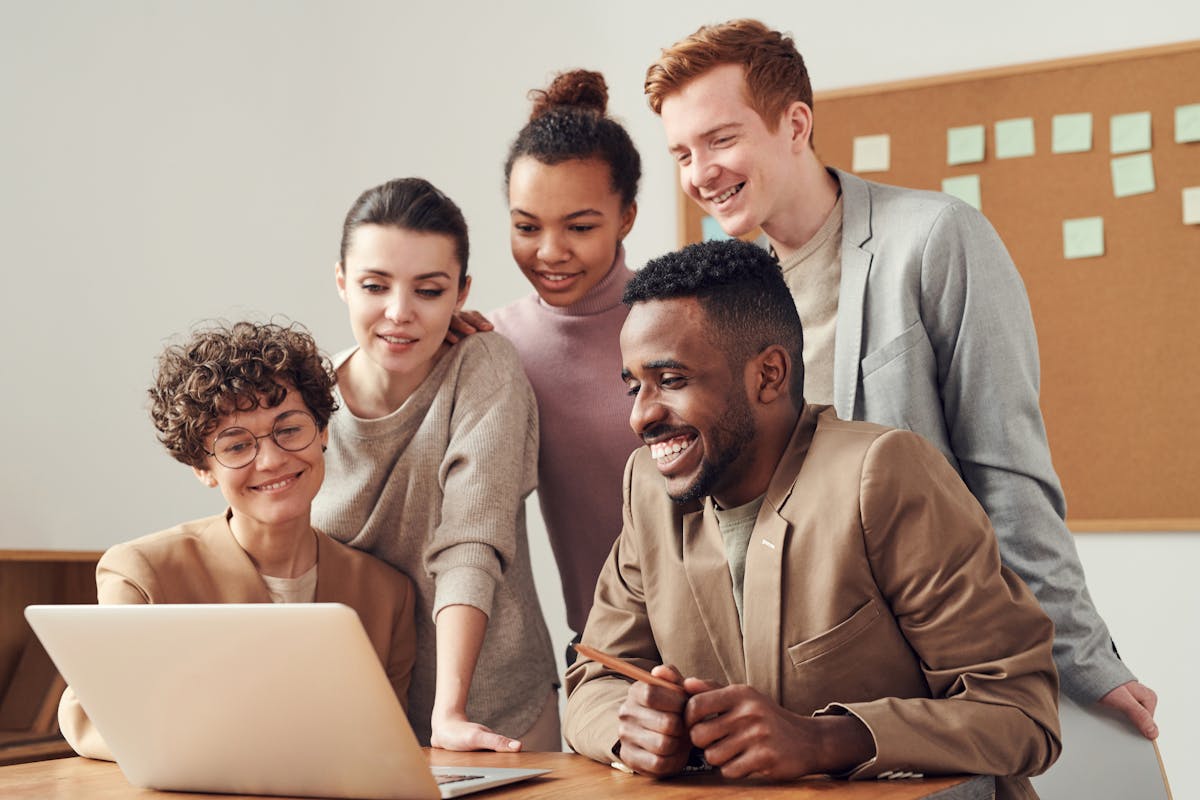 Business team reviewing documents together around a conference table