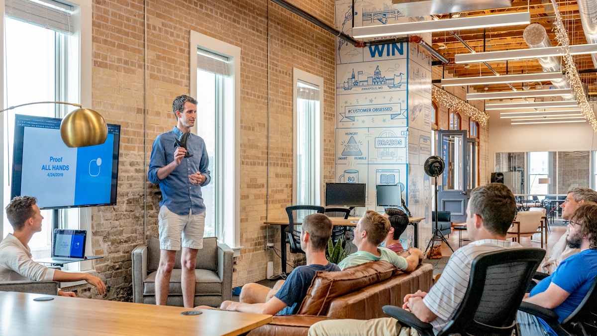 Diverse professionals meeting in a modern office to discuss marketing and growth